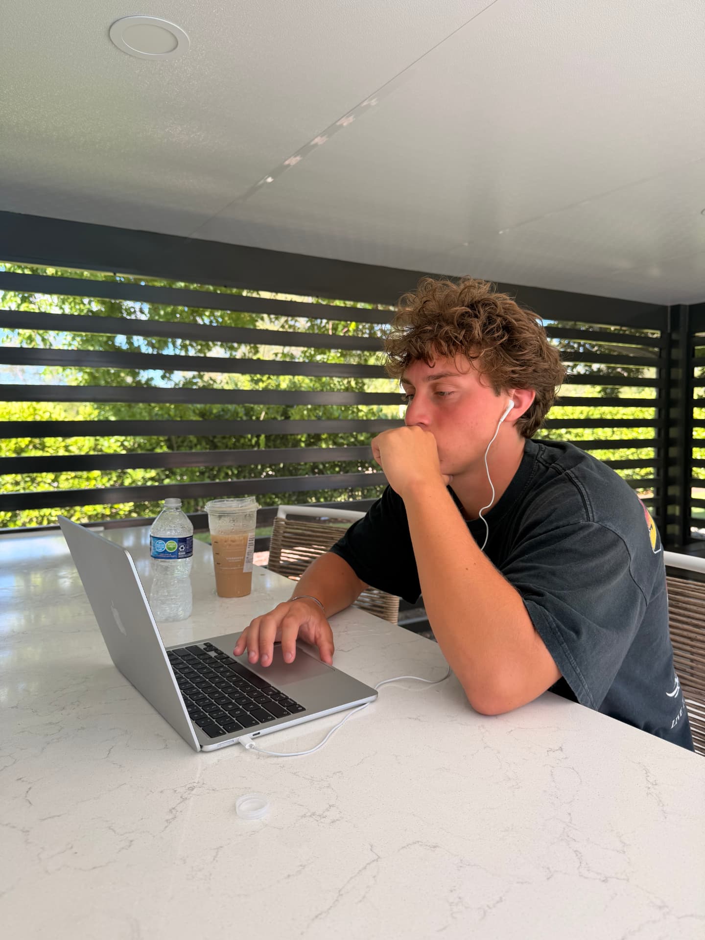 Grant Perry working at his laptop